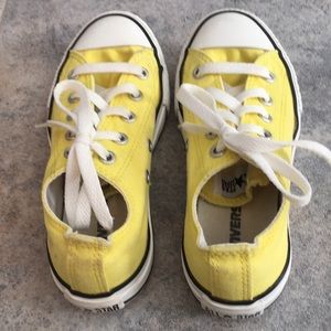 Girls size 13 yellow Converse sneakers.